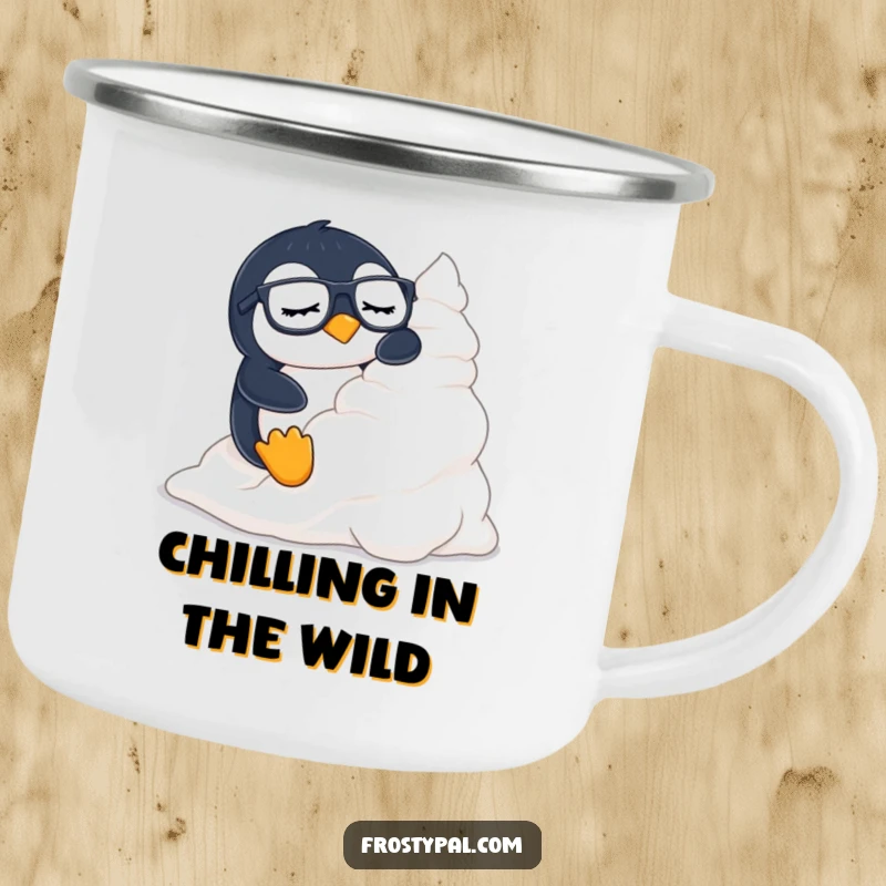 Funny penguin camping mug shows a sleepy penguin wearing glasses sliding down a mountain of whipped cream.
