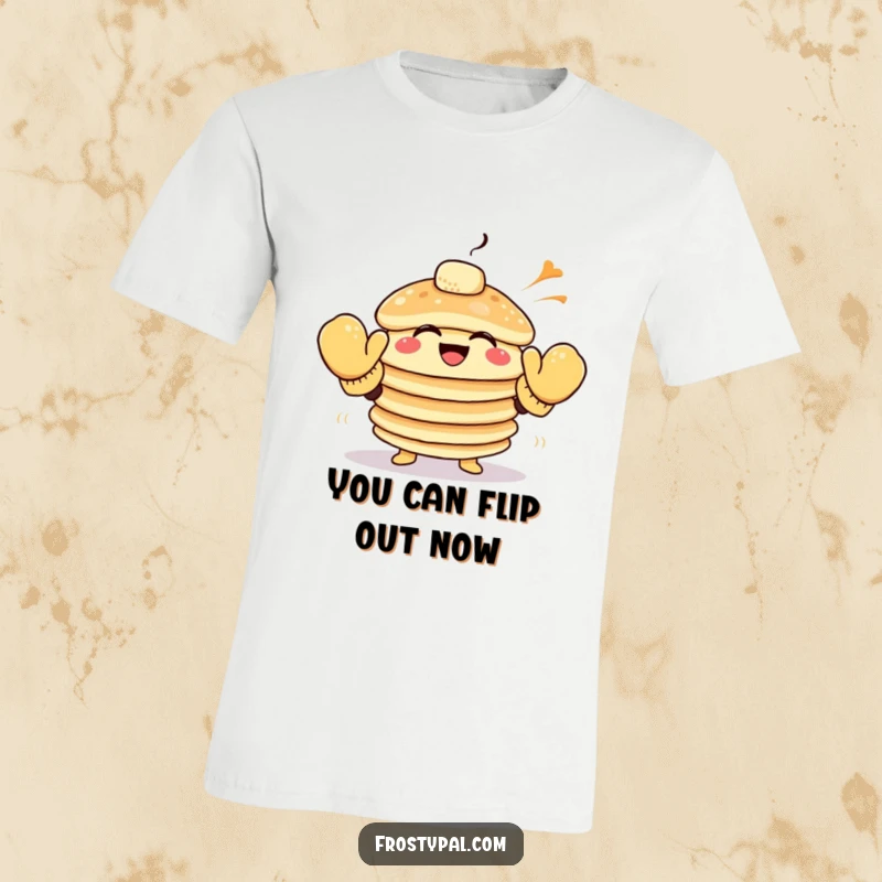 Funny pancake t-shirt depicts a giggling stack of pancakes wearing oversized mittens, reaching for a gust of wind.